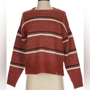 Others follow large Striped Rust coloured Sweater